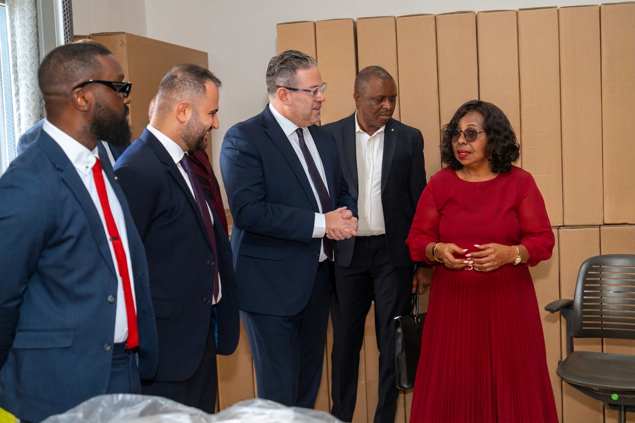 Jon McDermott, Director NDX, with H.E. Professor Nalova Lyonga, Minister of Secondary Education, and the MINESEC delegation at the handover in Yaoundé.